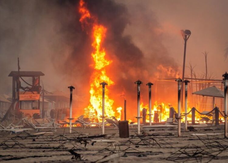 A view of a fire at Le Capannine beach in Catania, Sicily, Italy, July 30, 2021.