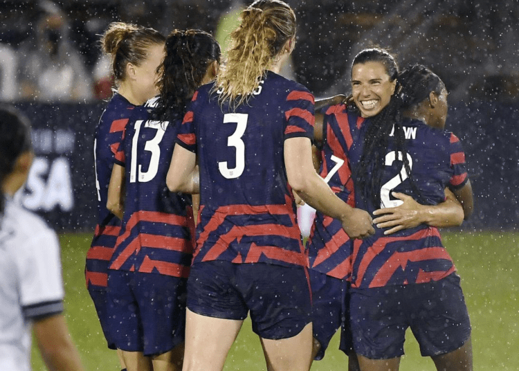 United States' Tobin Heath, second from right, celebrates her goal with teammates during their international friendly soccer match against Mexico, in East Hartford, Conn.