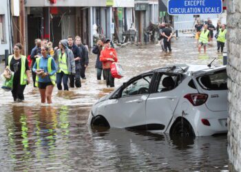 Belgian toll mounts to 24 as PM visits flood zone