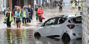 Belgian toll mounts to 24 as PM visits flood zone