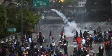 Thai police fire tear gas in protest over Covid response