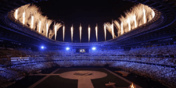 Olympics-Fireworks light up Tokyo as it prepares to douse Olympic flame