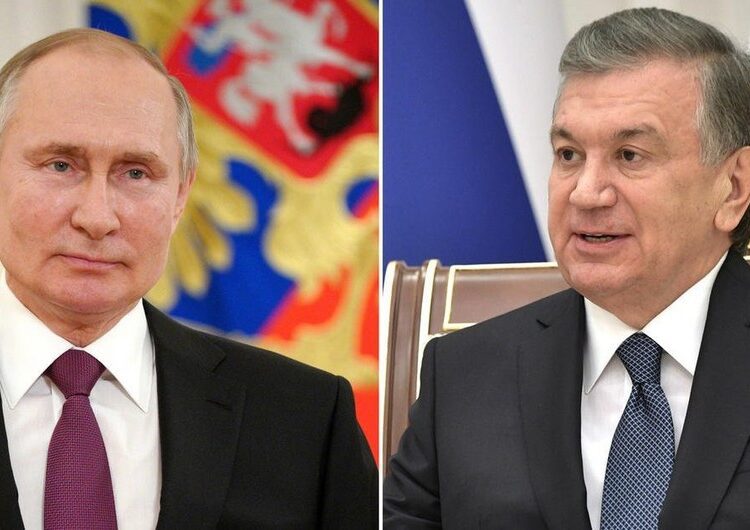 Putin (L) discusses situation in Afghanistan with his Uzbek counterpart