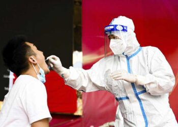 China orders mass testing in Wuhan as Covid outbreak spreads