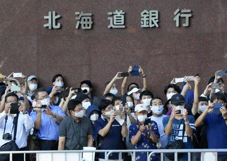 Japan further expands virus emergency areas as cases surge 1 - Egyptian Gazette More than 35,000 patients in Tokyo are recovering at home, about one-third of them unable to find a hospital or hotel vacancies immediately. Only a small percentage of hospitals are taking virus patients, either for financial reasons or because they lack the capability to treat the infections, experts say.Japan has weathered the pandemic better than many other countries, with around 15,600 deaths nationwide since the start, but its vaccination efforts lag behind other wealthy nations. About 40% of the population has been fully vaccinated, mainly elderly people.Economy and Fiscal Policy Minister Yasutoshi Nishimura, also in charge of the COVID-19 measures, said Wednesday that infections are spreading among those in their 20s to 50s who are largely unvaccinated. He urged them to take extra caution.“Just imagine you may be the one getting infected tomorrow,” he said.Rising infections among schoolchildren and teenagers could accelerate the surge as they begin returning to school after the summer vacation, said Dr. Shigeru Omi, top government medical advisor. He proposed schools curtail activity and urged high schools and colleges to return to online classes.“Infections in Tokyo are showing no signs of slowing, and the severely tight medical systems will continue for a while,” he told a parliamentary session Wednesday.The government has faced criticism for holding this summer’s Tokyo Olympics and Paralympics despite strong opposition from the public. Officials deny any direct link between the games and the spike in infections.