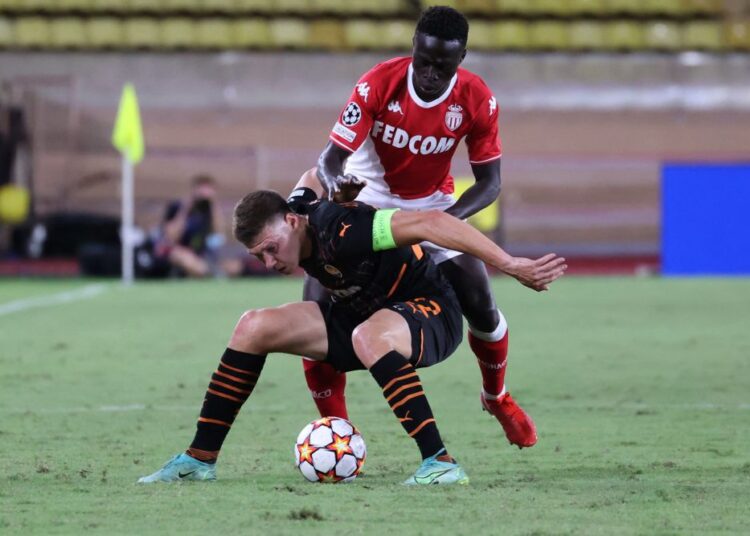 Monaco's Senegalese midfielder Krepin Diatta in action against Shakhtar Donetsk's Ukrainian defender Mykola Matviyenko at the Louis II Stadium in Monaco August 17, 2021.