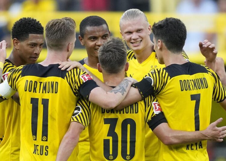 Borussia Dortmund's Erling Haaland celebrates after he scored his side's 5th goal during the German Bundesliga match against Eintracht Frankfurt.