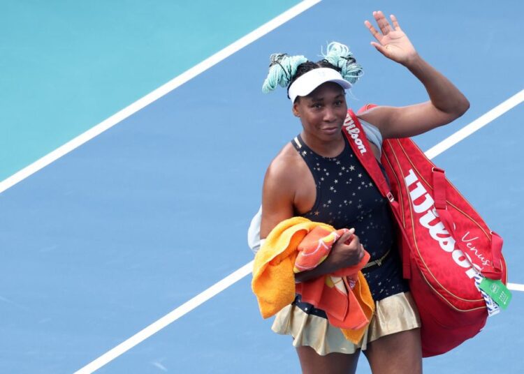 Venus Williams of the United States waves to fans while leaving the court after her match against Zarina Diyas of Kazakhstan in the first round of the Miami Open at Hard Rock Stadium in Miami March 23, 2021.