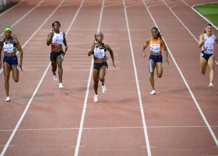 From left: Elaine Thompson-Herah of Jamaica, Shericka Jackson of Jamaica, Shelly-Ann Fraser-Pryce of Jamaica, Marie-Josee Ta Lou of Ivory Coast and Ajla Del Ponte of Switzerland compete in the women's 100 meters race at the Athletissima IAAF Diamond League international athletics meeting in Lausanne, Switzerland.