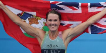 Flora, Kristian claim world triathlon titles