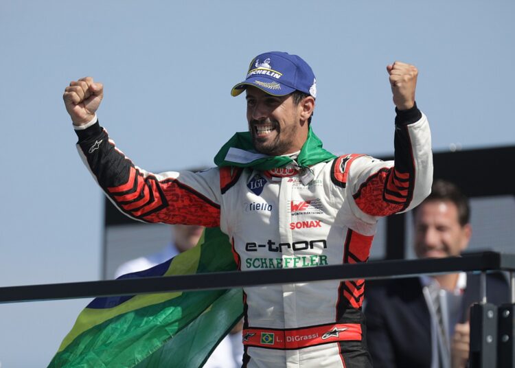Brazilian Lucas di Grassi celebrates after winning the penultimate race of the Formula E season in Berlin.