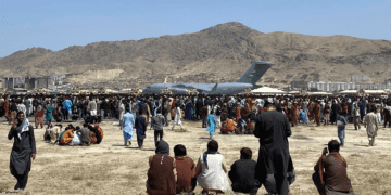 Taliban fire in the air to control crowd at Kabul airport