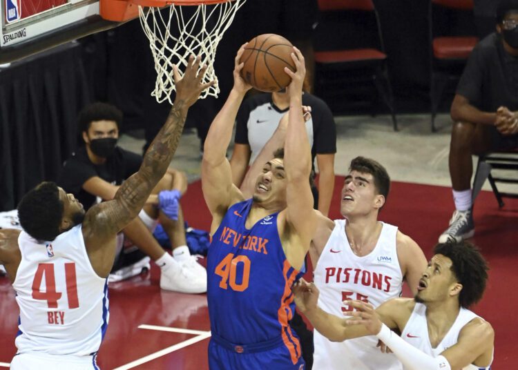 New York Knicks Reid Travis (40) shoots against the Detroit Pistons during their NBA summer league game on Aug. 13, 2021, in Las Vegas.