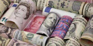 Sterling holds gains vs. dollar after risk-led rebound