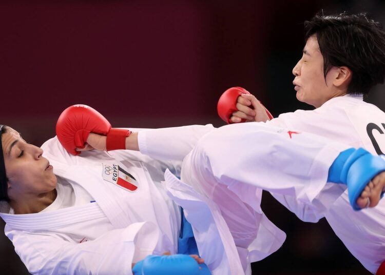 Egyptian Karate player Giana Farouk (L) won on Friday the bronze medal in the women's kumite karate -61kg division.