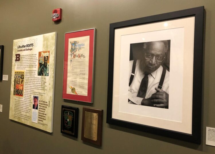 A photo of late author Alex Haley hangs on the wall of the Alex Haley Museum and Interpretive Center on Aug. 13, 2021, in Henning, Tennessee. The museum is honoring the writer of "Roots: The Saga of an American Family," on the 100th anniversary of Haley's birthday.