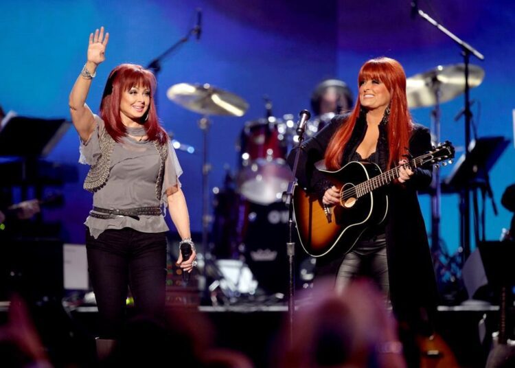 The Judds, Naomi Judd, left, and Wynonna Judd perform at the Girls' Night Out: Superstar Women of Country in Las Vegas on April 4, 2011. The Grammy-winning duo will be inducted into the Country Music Hall of Fame.