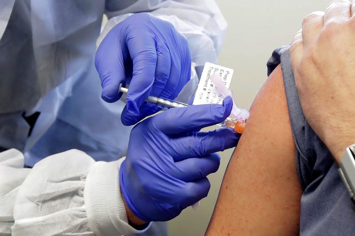 US administers 362.7 mln doses of COVID-19 vaccines 1 - Egyptian Gazette A person receives a COVID-19 vaccine as cases of the coronavirus disease (COVID-19) surge in Ponchatoula, Louisiana, US.