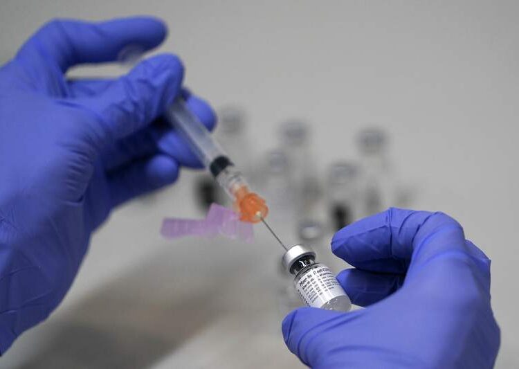 Vials labelled "AstraZeneca, Pfizer - Biontech, Johnson&Johnson, Sputnik V coronavirus disease (COVID-19) vaccine" are seen in this illustration picture taken May 2, 2021.
