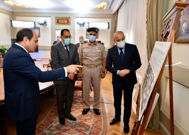 President Abdel Fattah El Sisi following up, during a meeting on Tuesday with Prime Minister Moustafa Madbouli as well as a host of ministers and top government officials, the state’s plan to develop and modernise the road network and traffic axes and to restore the civilised image of Greater Cairo.