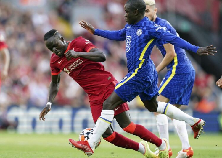 Liverpool's Sadio Mane (L) is fouled by Chelsea's N'Golo Kante during their English Premier League match at Anfield.