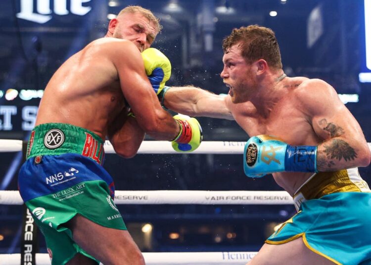 Canelo Alvarez (R) and Billy Joe Saunders during a super middleweight boxing title fight on May 8, 2021 in Arlington, Texas. Alvarez confirmed that he will face Plant for the undisputed super middleweight title on Nov. 6 in Las Vegas.