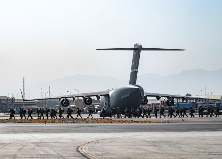 US soldiers, assigned to the 82nd Airborne Division, arriving to provide security in support of Operation Allies Refuge at Hamid Karzai International Airport in Kabul.