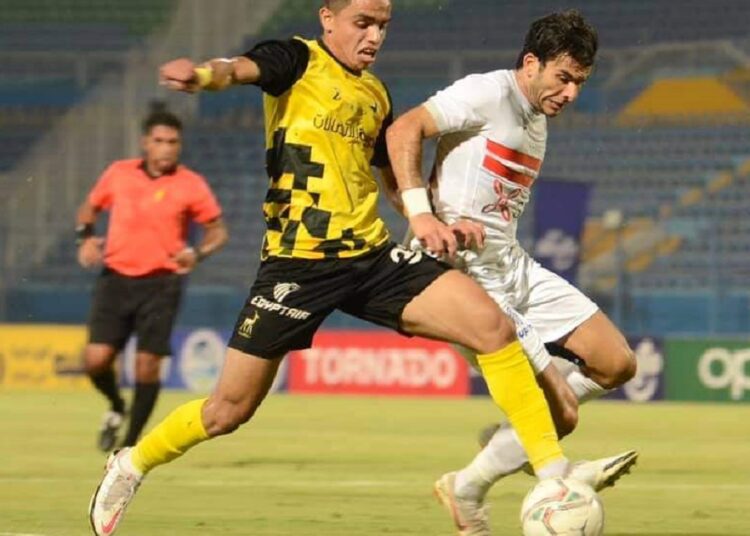 Zamalek's winger Ahmed Sayed 'Zizo' (R) vying for the ball against Wadi Degla defender during their match at the Egyptian Premier League.