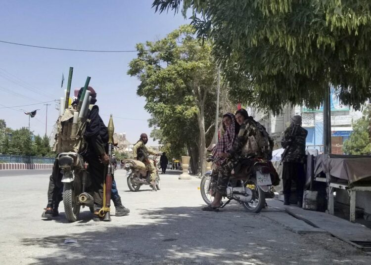 Taliban take 10th Afghan provincial capital, squeezing Kabul 1 - Egyptian Gazette Taliban fighters patrol inside the city of Ghazni, southwest of Kabul, Afghanistan, Thursday.