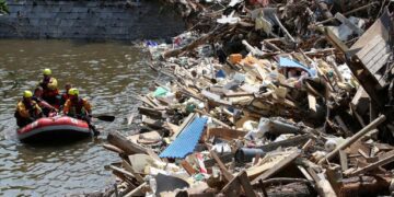 One month after floods, Belgians try to rebuild