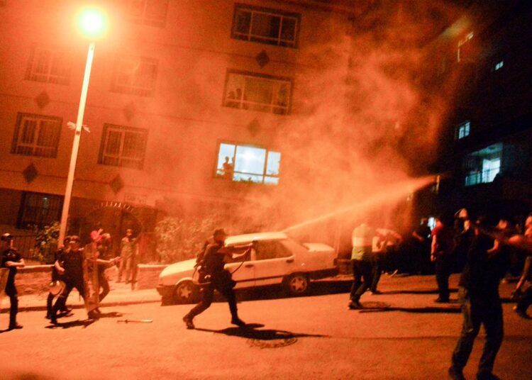 Turkey holds dozens more after attacks on Syrian shops 1 - Egyptian Gazette Turkish police use tear gas to disperse men who smash up shops and homes, believed to be owned by Syrian families, during an unrest, which broke out in response to a fight between locals and migrants, in Ankara