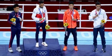 Olympics-Boxing: Sousa earns Brazil gold