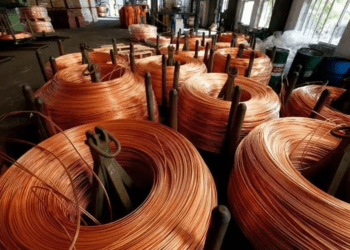 Copper edges up as dollar halts after gains