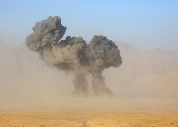 Russia showcases new arms at drill near Afghan border 1 - Egyptian Gazette Smoke rises during joint military drills involving Russia, Uzbekistan and Tajikistan, at the Harb-Maidon training ground, located near the Tajik-Afghan border in the Khatlon Region of Tajikistan August 10, 2021.