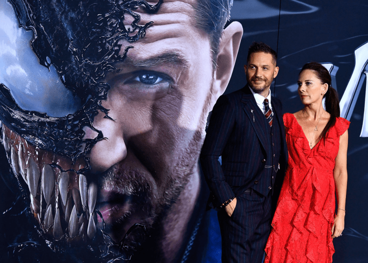 Tom Hardy and Kelly Marcel attend the premiere Of Columbia Pictures' "Venom" at Regency Village Theatre on October 1, 2018 in Westwood, California.