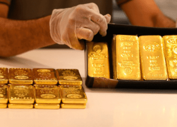 Gold firms above $1,800 on softer dollar