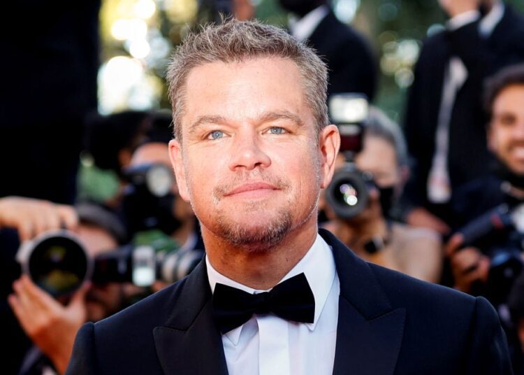 Matt Damon poses for the cameras on the red carpet at the 74th Cannes Film Festival July 8, 2021.
