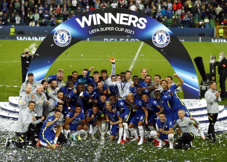 Soccer Football - European Super Cup - Chelsea v Villarreal - Windsor Park, Belfast, Northern Ireland - August 11, 2021 Chelsea's Cesar Azpilicueta and teammates celebrate with the trophy after winning the penalty shoot-out Action Images via Reuters/Jason Cairnduff