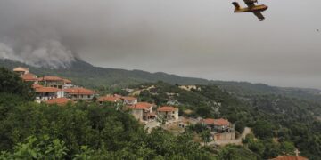 Forest fires rage in Greece; blaze north of Athens rekindles