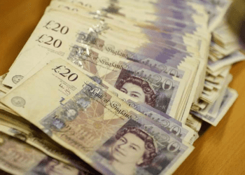 Sterling hovers near recent lows, unmoved by inflation slowdown
