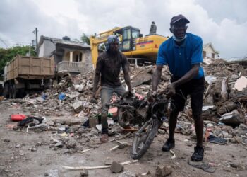 Haitians sheltering in tents grow impatient for aid after devastating quake