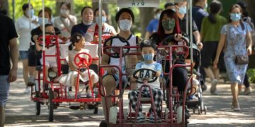 China allows couples third child amid demographic crisis