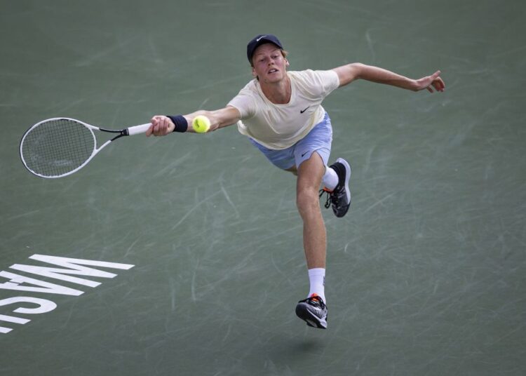 Jannik Sinner stretches for a forehand against Mackenzie McDonald during the singles final match at Citi Open at Rock Creek Park Tennis Centre, Washington August 8, 2021.