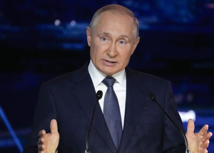 In this Sept. 3, 2021, file photo, Russian President Vladimir Putin gestures as he delivers his speech during a plenary session at the Eastern Economic Forum in Vladivostok, Russia. The embattled opposition groups admit the Kremlin has left them few options and resources ahead of the Sept. 19 election that is widely seen as a key to Putin’s effort to cement his hold on power. But they still hope to erode the dominance of the ruling United Russia party in the State Duma, or parliament.