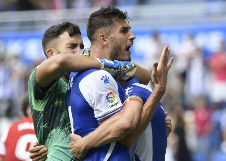 Real Madrid frustrated by Villarreal 1 - Egyptian Gazette Alaves players celebrate after defeating Atletico Madrid at the end of La Liga match in Vitoria, Spain.