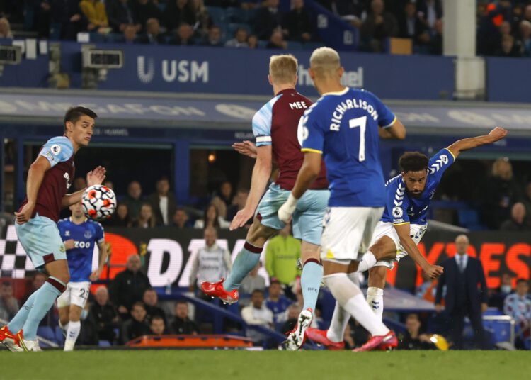 Everton's Andros Townsend shoots at Burnley’s goal during their match at the English Premier League.