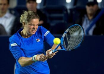 Clijsters suffers first-round exit in comeback match in Chicago