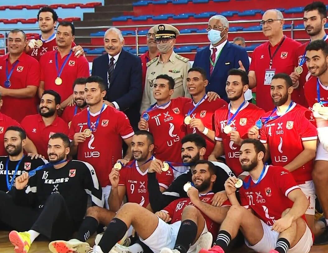 Al-Ahly’s players and coaching staff posing for a group photo after winning the African Handball Cup Winners’ Cup champions.