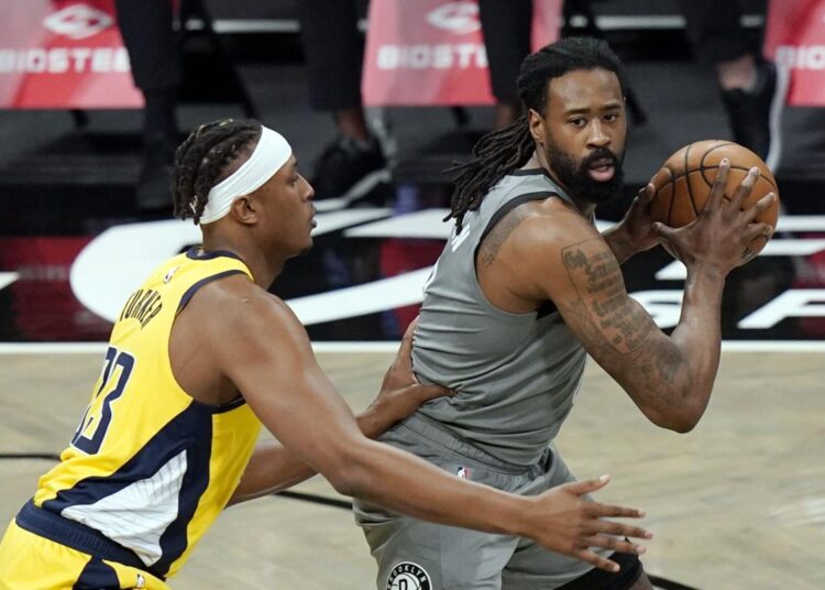 Pistons get Jordan in multiplayer deal with Nets 1 - Egyptian Gazette Brooklyn Nets' DeAndre Jordan (R) looks for an outlet as Indiana Pacers' Myles Turner defends during their NBA game in New York on Feb. 10, 2021.