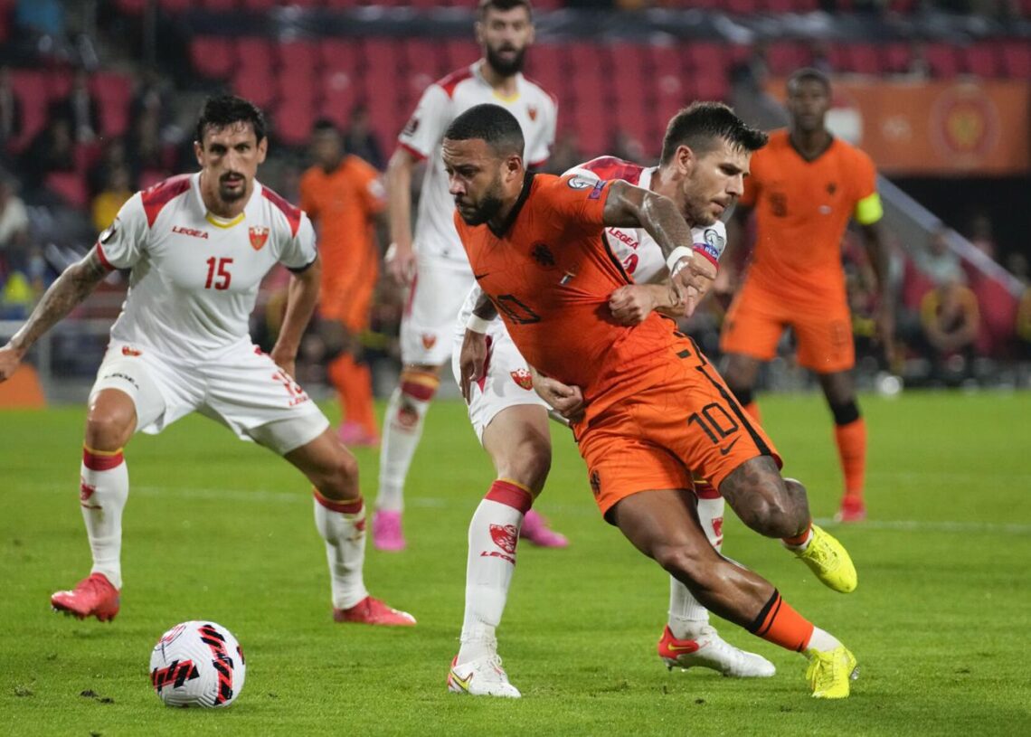 France draw again as Dutch roll in World Cup qualifying 1 - Egyptian Gazette Memphis Depay of the Netherlands is fouled in the penalty box by Montenegro's Dusan Lagator, during the World Cup 2022 group G qualifying match in Eindhoven.
